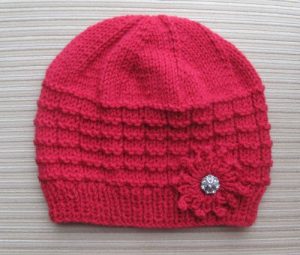 Download Knitting Pattern Red Hat in Waffle Stitch with a Knitted Flower for a Lady pdf, epub, ebook